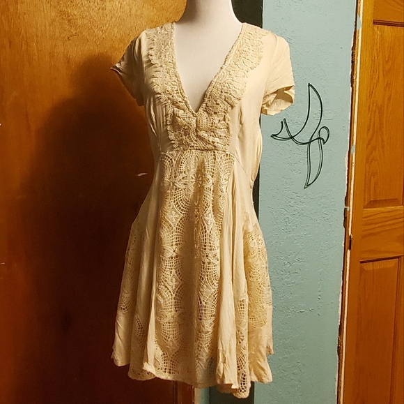 the clothing company Dresses & Skirts - Boho Crochet Dress